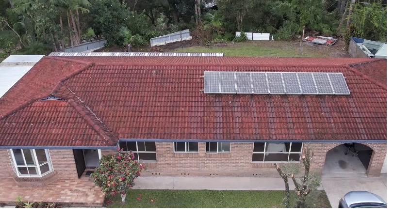 Faded cement tile roof before restoration